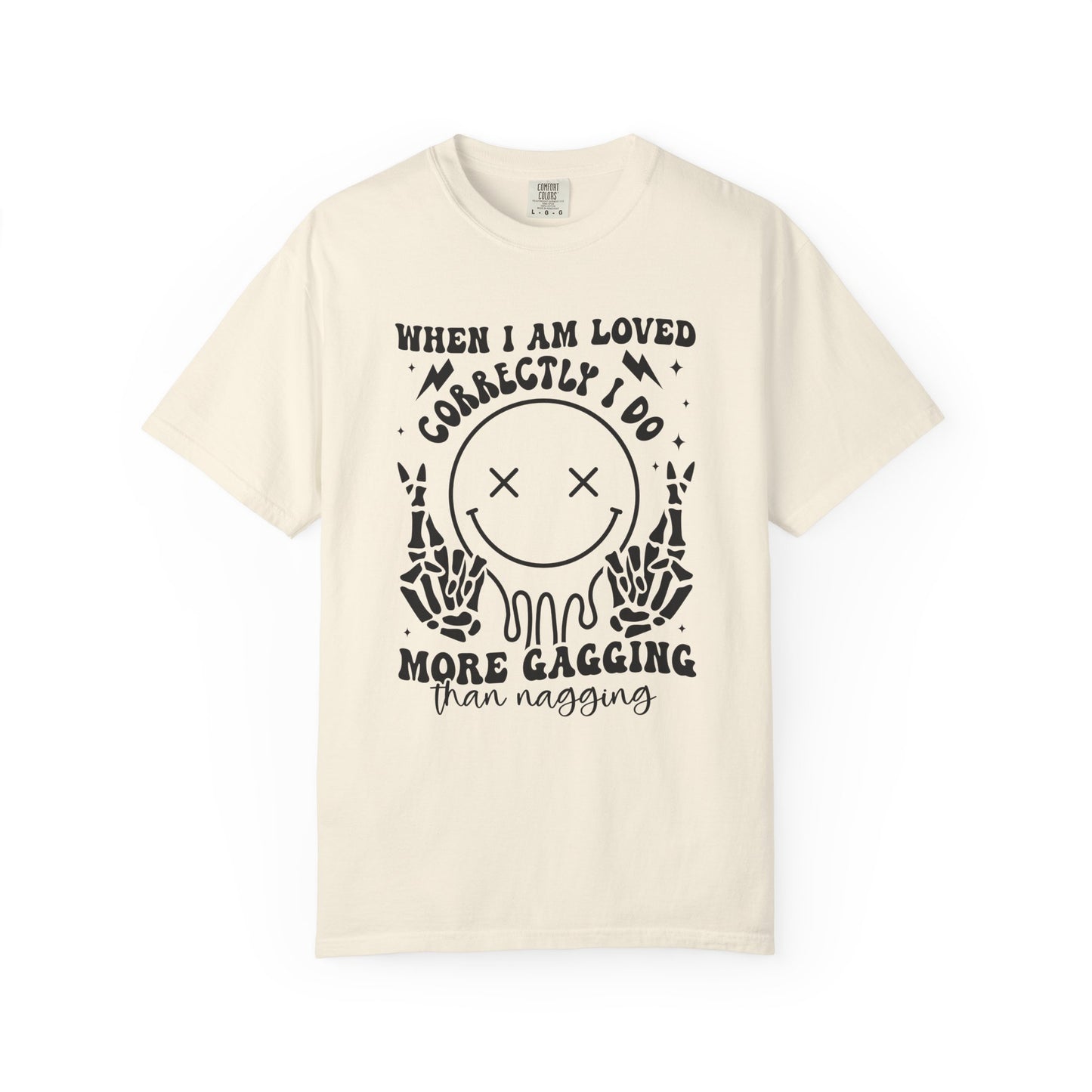 Graphic T-Shirt — "When I Am Loved Correctly I Do More Gagging Than Nagging" Smiley Skeleton Tee