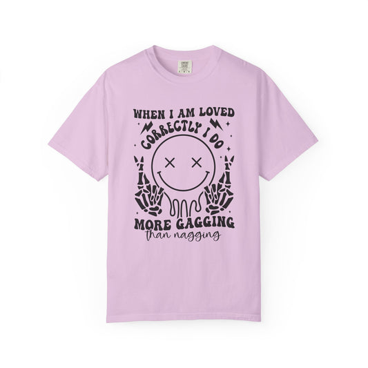 Graphic T-Shirt — "When I Am Loved Correctly I Do More Gagging Than Nagging" Smiley Skeleton Tee