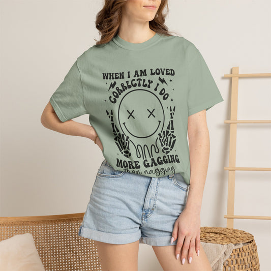 Graphic T-Shirt — "When I Am Loved Correctly I Do More Gagging Than Nagging" Smiley Skeleton Tee