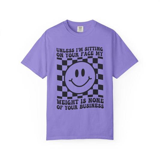 Graphic T-Shirt — "Unless I’m Sitting On Your Face My Weight Is None Of Your Business" Smiley Checker Tee