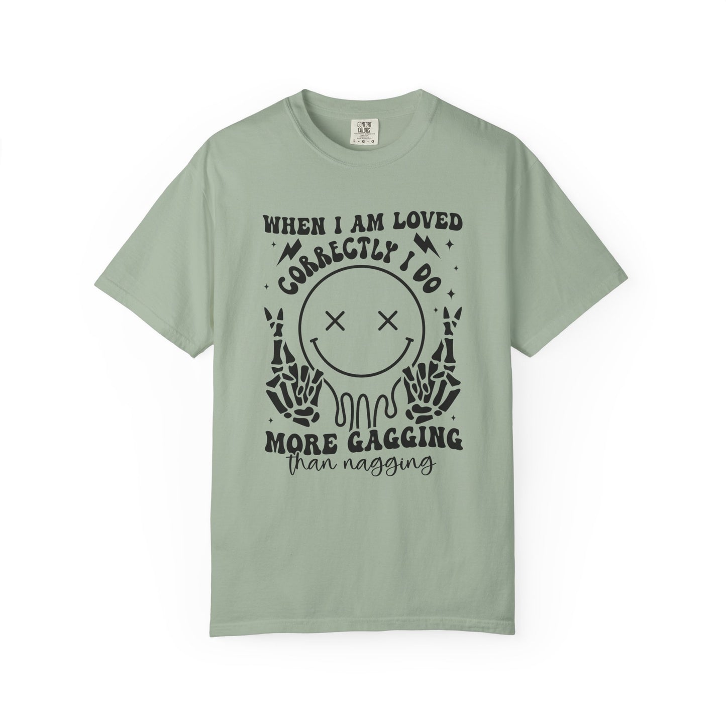 Graphic T-Shirt — "When I Am Loved Correctly I Do More Gagging Than Nagging" Smiley Skeleton Tee